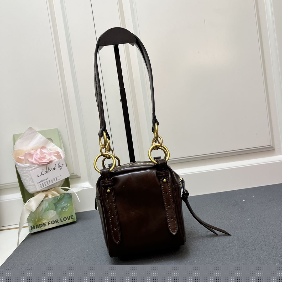 Pra*a top handle bags